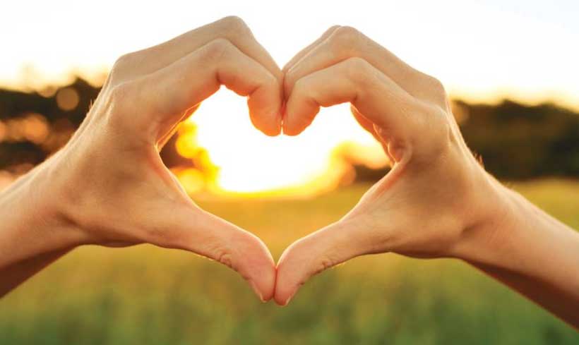 Image of hands forming the shape of a heart